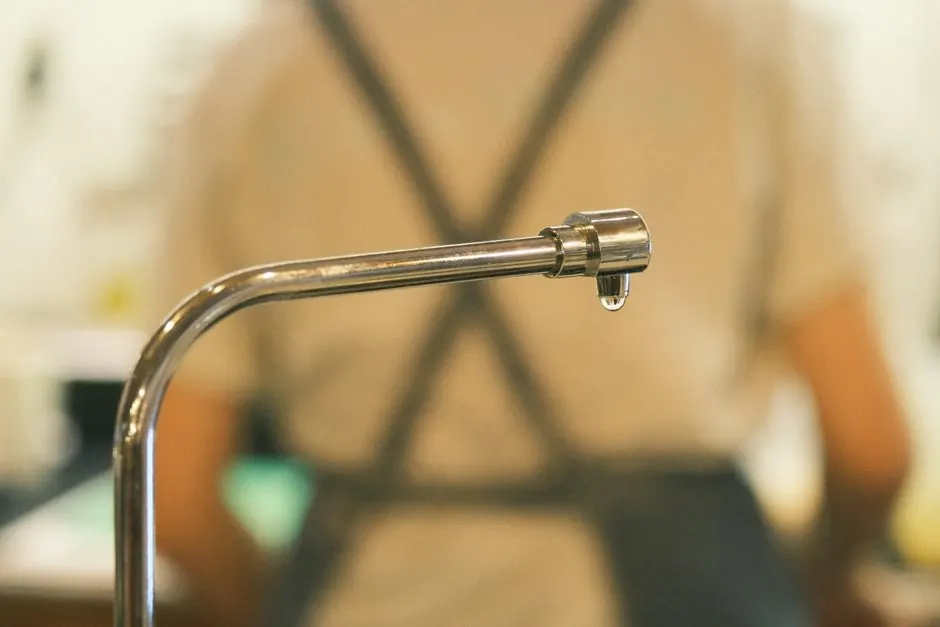 Technician using tools during a service visit